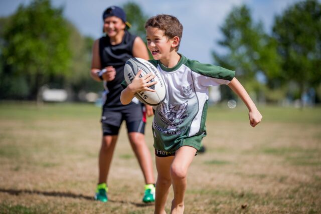Boy Playing Rugby Asthma And Exercise